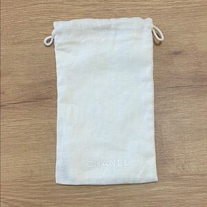 CHANEL Ivory drawstring bag